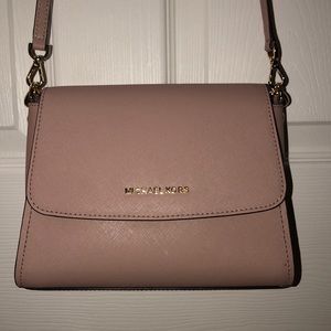 Michael Kors hand bag/purse. Cross body style